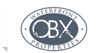 Outer Banks Real Estate Mike and Stacy Siers Howard Hanna Logo